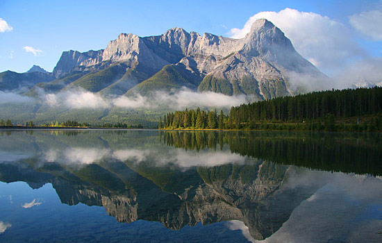  - After traveling through the Kootenays, drive Banff National Park.