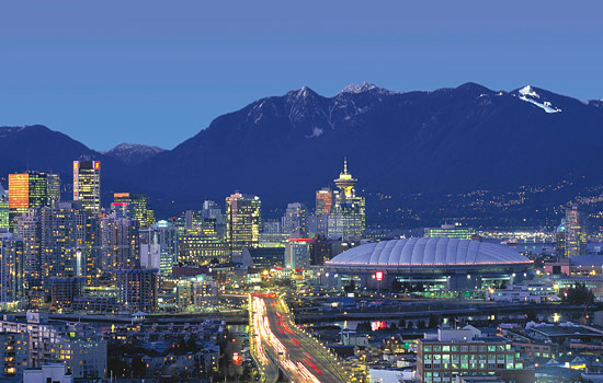 You arrive in Vancouver and are welcomed by beautiful ocean and mountain vistas.