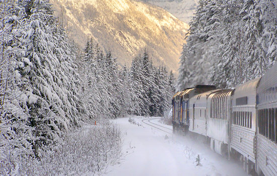 Canadian railway - Canada rail - A train ride through silent snow covered forests awaits